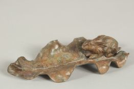 AFTER A. BARYE A SPELTER RABBIT ON A LEAF. 16ins long.