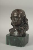 A BRONZE BUST OF A GIRL on a square marble base. 6ins high.