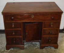 A GEORGE III MAHOGANY ARCHITECTS / WRITING DESK the frieze drawer fitted with a beize lined