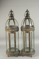 A PAIR OF TALL COPPER LANTERNS 2ft 6ins high.