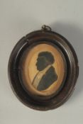A VICTORIAN OVAL FRAMED SILHOUETTE OF A MAN. 4ins x 3ins.