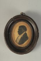 A VICTORIAN OVAL FRAMED SILHOUETTE OF A MAN. 4ins x 3ins.