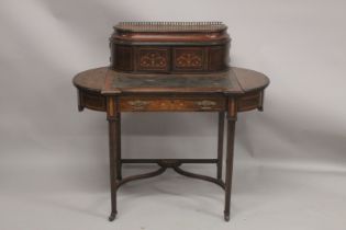 A LADIES VICTORIAN ROSEWOOD INLAID WRITING DESK with brass galley, a pair of panel doors, leather