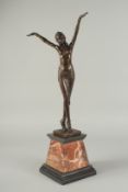 AFTER D. H. CHIPPARUS. A BRONZE DANCING GIRL. Signed, on a marble base. 19ins high.