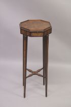A GEORGIAN MAHOGANY INLAID OCTAGONAL TOP URN STAND with brushing slide on tapering legs with cross