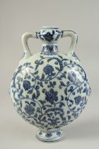 A CHINESE BLUE AND WHITE LOTUS MOON FLASK. 28cm high.