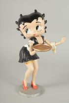 A PAINTED CAST IRON FIGURE OF BETTY BOOP. 12ins high.