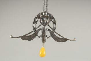 A DECO STYLE SILVER AMBER DROP PENDANT AND CHAIN.