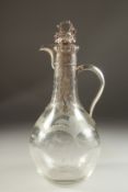A GOOD VICTORIAN GLASS AND SILVER CLARET JUG by GEORGE FOX with fruiting vine stopper. London 1855.