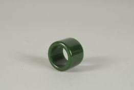 A JADE ARCHER'S RING.