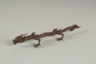 A LARGE BRONZE DRAGON. 6ins long.