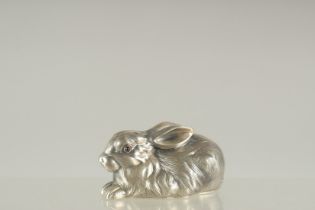 A RUSSIAN SILVER RABBIT. 2.5ins long. Mark: Faberge, Head 88, I P. Weight: 59gms.