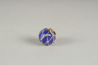 A RUSSIAN SILVER AND BLUE ENAMEL BALL LOCKET.