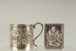 A BURMESE SILVER MUG repousse with lion and a BOX SHAPED BOX. (2).