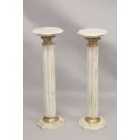 A GOOD PAIR OF WHITE MARBLE CLUSTER COLUMNS with octagonal tops and bases. 3ft 4ins high.