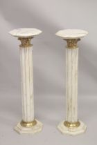 A GOOD PAIR OF WHITE MARBLE CLUSTER COLUMNS with octagonal tops and bases. 3ft 4ins high.