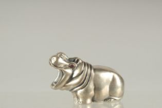 A RUSSIAN SILVER HIPPO. 3ins long. Mark: Faberge, Head 84, I P. Weight: 74gms.