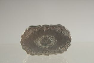 A VICTORIAN ENGRAVED SILVER SNUFF BOX. Birmingham 1874. Maker: E. C.