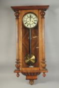 A VICTORIAN MAHOGANY HANGING WALL CLOCK with cream dial, Roman numerals and brass pendulum with