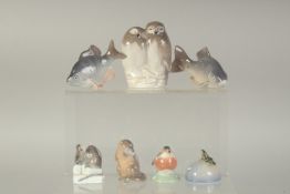 SEVEN SMALL COPENHAGEN PORCELAIN FIGURES: TWO OWLS, No. 834, SALMON, No. 2414, CARP No. 2553, OTTER,