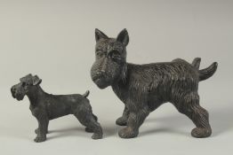 TWO CAST IRON DOGS. 7ins & 4ins.
