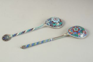 TWO RUSSIAN SILVER AND ENAMEL SPOONS. 7.5ins long. Marks: head, 84 A A over 1889. Weight: 138gms.