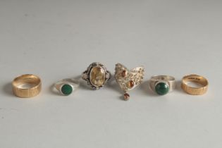 A MODERN SILVER CITRINE RING by PADDY HARBER and another BY S. BEDDALL, two others and two gold