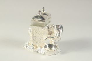 A SILVER PLATED NOVELTY CRUET SET, modelled as an elephant with cruets on it's back. 4.5ins long.