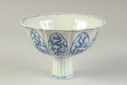 A CHINESE BLUE AND WHITE PETAL FORM STEM CUP. 17cm wide.