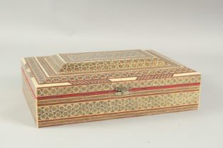 AN INDIAN INLAID JEWEL BOX. 11ins long.