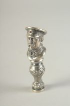 A CAST SILVER AND DIAMOND SET SEAL in the form of the bust of Stalin. 3ins high.
