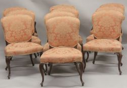 A SUPERB SET OF TEN 19TH CENTURY HEPPLEWHITE DINING CHAIRS, two with arms, with padded seats and