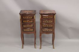 A GOOD PAIR OF LOUIS XVITH DESIGN BEDSIDE TABLES fitted with four drawers on curving legs. 1ft