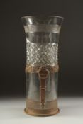 AN 19TH CENTURY FRENCH BRASS AND GLASS VASE. 9.5ins high.