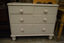 A painted pine chest of drawers.