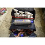 Two cases containing car cleaning equipment.