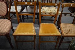 A pair of Edwardian bedroom chairs.