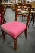 A set of six Victorian mahogany dining chairs.