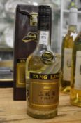 A bottle of Yang Ling spirit, the bottle containing a coiled snake.