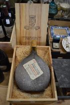 A two litre bottle of Du Castaing Armagnac, complete with original wooden case.