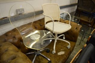 Two stylish swivel chairs.