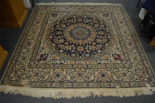 A cream ground Persian design carpet with floral decoration 200cm x 200cm.