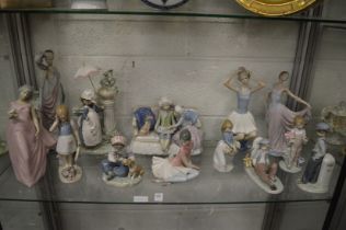 A good large collection of Lladro and similar figure groups.