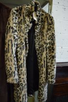 A Denim Hunter faux leopard skin coat.