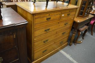 An Edwardian ash chest of drawers.