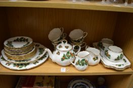 A quantity of Queens China Yuletide pattern dinner and tea ware.
