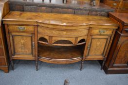 A Victorian inlaid rosewood sideboard.