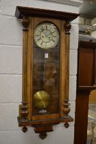 A Victorian Vienna style wall clock.