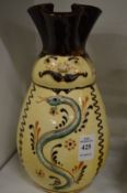 An unusual figural pottery vase.