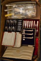 A collection of cased and uncased plated flatware.